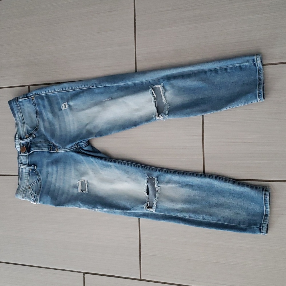 Distressed light denim crop jeans
